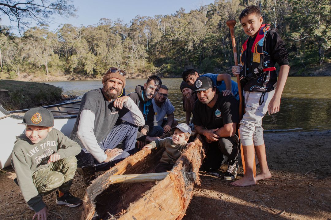 People with bark canoe